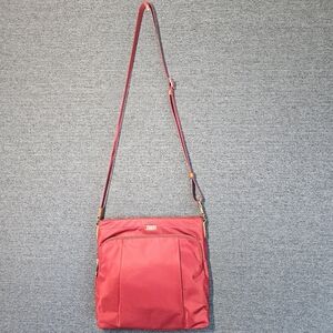 Tumi crossbody, shoulder bag.
